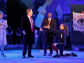 FILE - In this May 21, 2017, file photo provided by The Public Theater, Tina Benko, left, portrays Melania Trump in the role of Caesar&#039;s wife, Calpurnia, and Gregg Henry, center left, portrays President Donald Trump in the role of Julius Caesar during a dress rehearsal of The Public Theater&#039;s Free Shakespeare in the Park production of Julius Caesar in New York. Teagle F. Bougere, center right, plays as Casca, and Elizabeth Marvel, right, as Marc Anthony. Delta Air Lines is pulling its sponsorshi