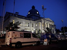 Media trucks are parked outside the Montgomery County Courthouse as the jury deliberates in Bill Cosby&#039;s sexual assault trial in Norristown, Pa., Monday, June 12, 2017.