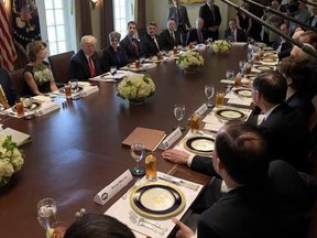 President Donald Trump speaks before having lunch with Republican Senators and White House staffers in the Cabinet Room of the White House in Washington, Tuesday, June 13, 2017.