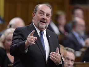 Conservative MP Denis Lebel asks a question during Question Period in the House of Commons in Ottawa on Monday, Oct.3, 2016. Longtime Conservative MP Lebel is quitting politics after nearly 10 years in the House of Commons. THE CANADIAN PRESS/Adrian Wyld