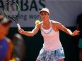 Gabriela Dabrowski of Ottawa in action during a first-round women's doubles match in the French Open on June 1. She and Rohan Bopanna of India have reached the mixed doubles semifinals.