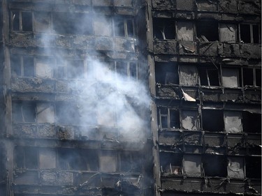The fire damaged floors of the 24 storey residential Grenfell Tower block in Latimer Road, West London on June 14, 2017 in London, England.  The Mayor of London, Sadiq Khan, has declared the fire a major incident as more than 200 firefighters are still tackling the blaze, while at least 50 people are receiving hospital treatment.