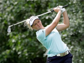 Brooke Henderson hits her tee shot on the seventh hole during the first round of the 2017 KPMG PGA Championship. On the fourth hole, she had saved par with a 60-foot putt from the fringe.