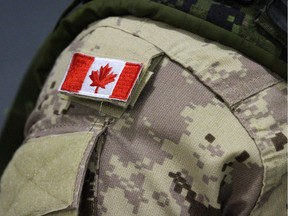 A Canadian flag sits on a members of Canadian forces that are leaving from CFB Trenton, in Trenton, Ont., on
