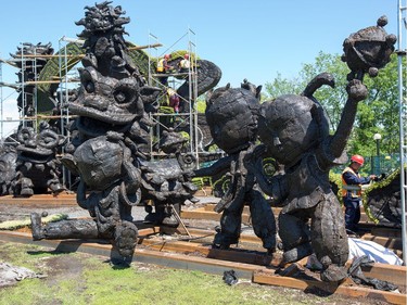 A group of dragons and traditional Chinese icons as prepared by a group from China as we get a sneak peek tour of the MosaiCanada 150 gardens opening at the end of June in Jacques Cartier Park in Gatineau.