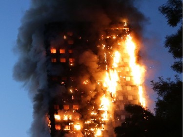 Fire engulfs Grenfell Tower, a residential tower block on June 14, 2017 in west London. The massive fire ripped through the 27-storey apartment block in west London in the early hours of Wednesday, trapping residents inside as 200 firefighters battled the blaze. Police and fire services attempted to evacuate the concrete block and said "a number of people are being treated for a range of injuries", including at least two for smoke inhalation.