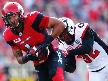 Stamps Football

Calgary Stampeders Lemar Durant carries the ball as Nicholas Taylor of the Ottawa Redblacks moves in to tackle him during CFL football in Calgary. AL CHAREST/POSTMEDIA
Al Charest, AL CHAREST/POSTMEDIA