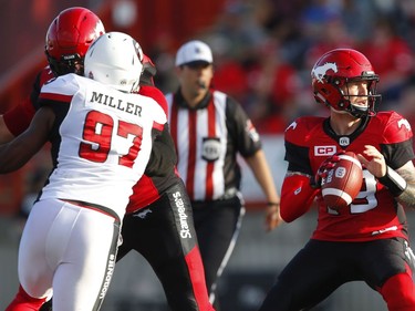 Stamps Football

Calgary Stampeders quarterback Bo Levi Mitchell looks to throw the ball while under pressure from Steve Miller of the Ottawa Redblacks during CFL football in Calgary. AL CHAREST/POSTMEDIA

Calgary Stampeders Football CFL
Al Charest, AL CHAREST/POSTMEDIA