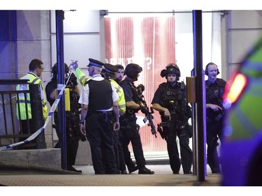 Armed police outside Monument station.