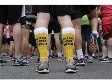 Ottawa craft beer enthusiasts descended on Lansdowne Park to partake in the 5K Ottawa Craft Beer Run along the Rideau Canal to raise funds for the Parkdale Food Centre, on Saturday, June 17. Simon Roussin sported appropriately themed socks to the race.

126925
David Kawai