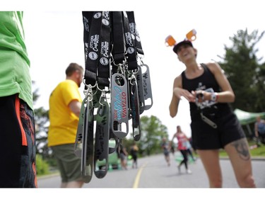 Ottawa craft beer enthusiasts descended on Lansdowne Park to partake in the 5K Ottawa Craft Beer Run along the Rideau Canal to raise funds for the Parkdale Food Centre, on Saturday, June 17. Bottle opener medals were handed out at the end of the race.

126925
David Kawai