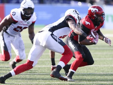 Terry Williams, Jonathan Rose

Calgary Stampeders' Terry Williams (38) is tackled by Ottawa Redblacks' Jonathan Rose (9) in first quarter CFL action in Calgary, Thursday, June 29, 2017. THE CANADIAN PRESS/Mike Ridewood ORG XMIT: MR104
Mike Ridewood,