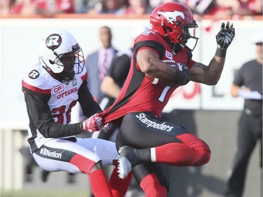 Lemar Durant, Nicholas Taylor

Calgary Stampeders' Lemar Durant (1) can't be stopped by Ottawa Redblacks' Nicholas Taylor (32) during first quarter CFL action in Calgary, Thursday, June 29, 2017. THE CANADIAN PRESS/Mike Ridewood ORG XMIT: MR101
Mike Ridewood,