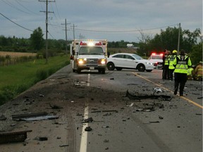 The scene of the fatal collision between an SUV and a transport truck on Snake Island Road on Sunday evening.