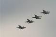 Four Royal Canadian Air Force CF-188 Hornet aircraft execute high speed maneuvres prior to landing at 4 Wing Cold Lake, Alberta duing Exercise MAPLE FLAG 50, on June 1, 2017.

Photo: MCpl HJL MacRae, 4 Wing Imaging, CK05-2017-0460-012