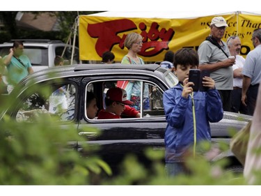 Stylish and sporty Italian cars were parked along the streets of Little Italy for people of all ages to admire and photograph on Saturday, June 17. (David Kawai)

126926
David Kawai