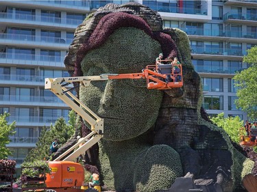 Mother Earth being worked on as we get a sneak peek tour of the MosaiCanada 150 gardens opening at the end of June in Jacques Cartier Park in Gatineau.