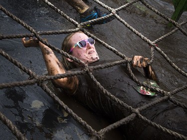 No one was going to finish the Mud Hero obstacles race Sunday June 4, 2017 at Commando Paintball in Navan clean.   Ashley Fraser/Postmedia