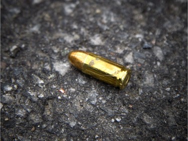 Ottawa Police and the SIU are investigating two shooting deaths in downtown Ottawa Saturday June 3, 2017. A stray bullet lay in a nearby parking lot.   Ashley Fraser/Postmedia