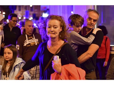 People run down Borough High Street.