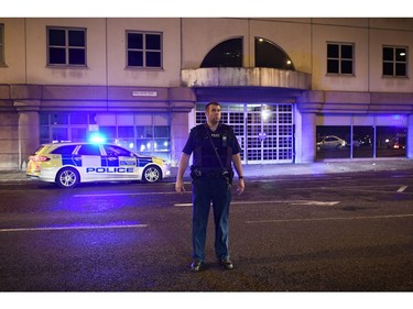 A police officer stands on Great Dover Street at London Bridge.