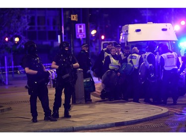 Armed police prep up in Borough.