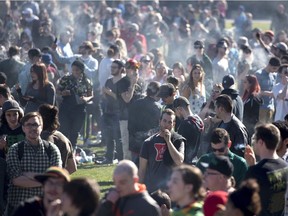 People gather on the lawns of Parliament Hill during the annual 420 marijuana rally, Wednesday, April 20, 2016 in Ottawa. THE CANADIAN PRESS/Justin Tang ORG XMIT: JDT107
Justin Tang,