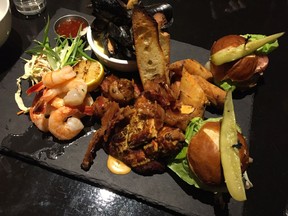 Sharing platter of appetizers at Amberwood Lounge and Eatery