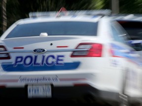 STOCK ART of Ottawa Police at Ambulance vehicles. Julie Oliver/Postmedia