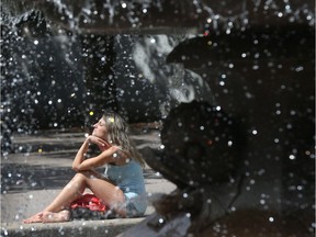 Desiree Martin enjoys the sunshine at Confederation Park in Ottawa.