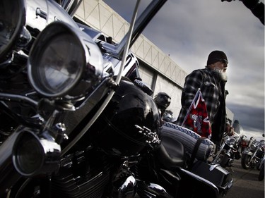 The Telus Ride For Dad kicked off from the Canada Aviation and Space Museum  Saturday June 3, 2017. The ride is to raise funds for prostate cancer research and raising public awareness of the disease. Pepe Valencia gets his bike ready with a Ride For Dad flag Saturday morning.