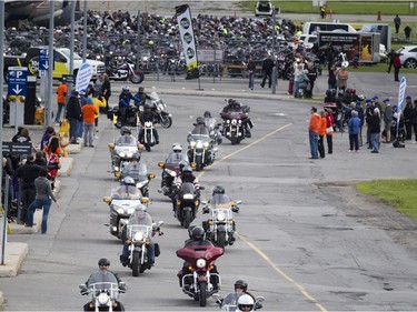 Ride for Dad participants head out from the Canada Aviation and Space Museum on Saturday.