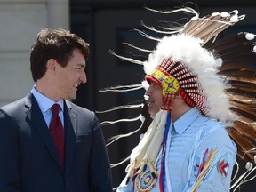 Prime Minister Justin Trudeau Perry Bellegarde, national chief of the Assembly of First Nations, celebrate National Indigenous Peoples Day in Ottawa on Wednesday, June 21, 2017. THE CANADIAN PRESS/Sean Kilpatrick ORG XMIT: SKP203
Sean Kilpatrick,