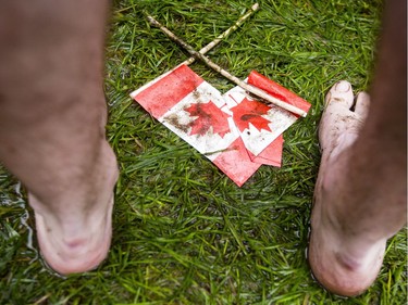 Rain turned the front lawn of Parliament Hill into a muddy mess during Canada Day celebrations in downtown Ottawa Saturday, July 1, 2017.