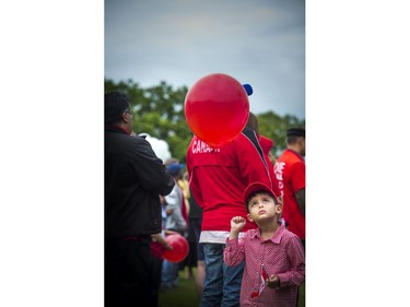 To celebrate Canada Day the Ahmadiyya Muslim Jama'at Ottawa organized a Canada Day Festival at Baitun Naseer Mosque in Cumberland Saturday July 1, 2017. Three and a half year old Sabeeh Ahmed with his flag and balloon Saturday.