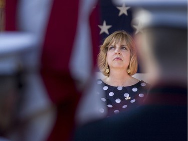 Chargé d'Affaires Elizabeth Aubin looks on during the presentation of the colours during the July 4th party at Lornado, the official residence of the United States Ambassador to Canada, Tuesday, July 4, 2017.