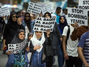 Protesters march in Ottawa on Saturday.