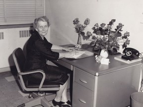 Alice Goyette was the second woman to serve with the Ottawa police. She is shown here at her desk in 1961, celebrating 25 years with the force.