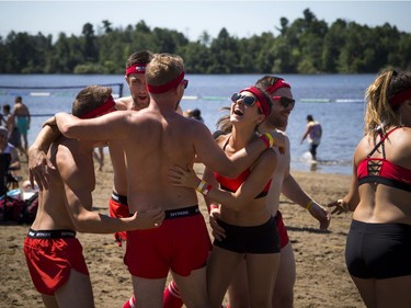 The hot sun made for perfect weather for HOPE Volleyball SummerFest that took over Mooney's Bay Park Saturday July 15, 2017. Hit Faced team were all smiles after winning their game.