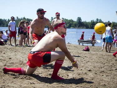 The hot sun made for perfect weather for HOPE Volleyball SummerFest that took over Mooney's Bay Park Saturday July 15, 2017. Nicolas Marcil digs deep to get the ball during a game Saturday.