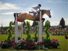 Beth Underhill riding Count Me In during the Ottawa International Horse Show at Wesley Clover Parks in 2016.   Ashley Fraser/Postmedia