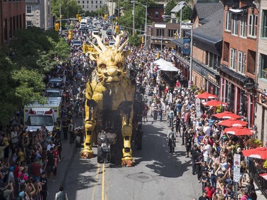 Long Ma, the dragon-horse, makes her way through the Byward Market during a La Machine performance Friday, July 28, 2017.