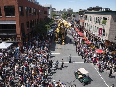 Long Ma, the dragon-horse, makes her way through the Byward Market during La Machine's performance on Friday.