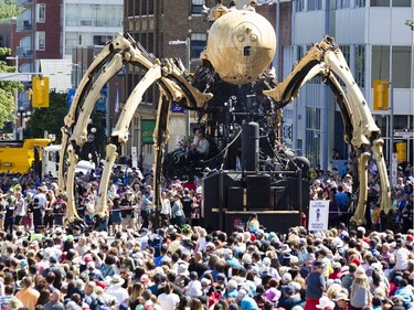 KUMO, the spider, makes her way through the Byward Market during a La Machine performance Saturday, July 29 2017.