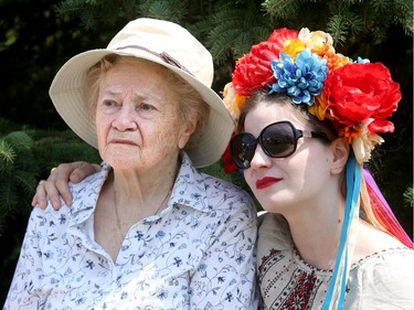 Kristina Dniprenko sits with her grandma, Mary Oleschuk, 90, who got emotional listening to the traditional music. "She remembers her father singing these to her to sleep when she was a little girl," explained Dniprenko at the Ukrainian festival.