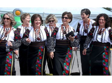 The women from the Melos Ukrainian Folk Ensemble, from Winnipeg, snuck in some happy shopping between sets on stage.