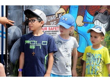 A group of kids didn't look too happy when told they were too tall for one of the kids' rides at the Lebanese festival.