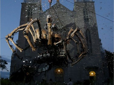 Kumo, a massive mechanical spider from La Machine, awoke atop of Notre Dame Cathedral Basilica in Ottawa as part of Canada 150 celebrations.  Julie Oliver/Postmedia