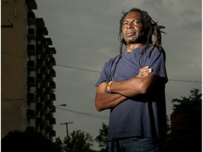 Royston Christie, 61, stands outside the home of the friend who's been putting him up ever since Christie lost his apartment nearby following an mistaken arrest for fentanyl.