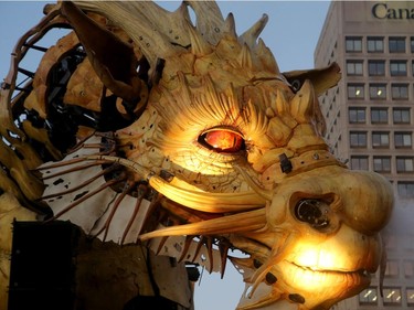 Kumo the spider and Long Ma the dragon-horse battled beside the Shaw Centre in downtown Ottawa in an epic fight scene that left the thousands of spectators in awe Friday (July 28, 2017) night. La Machine's mechanical spectacle continues in Ottawa's streets Saturday and Sunday. Julie Oliver/Postmedia